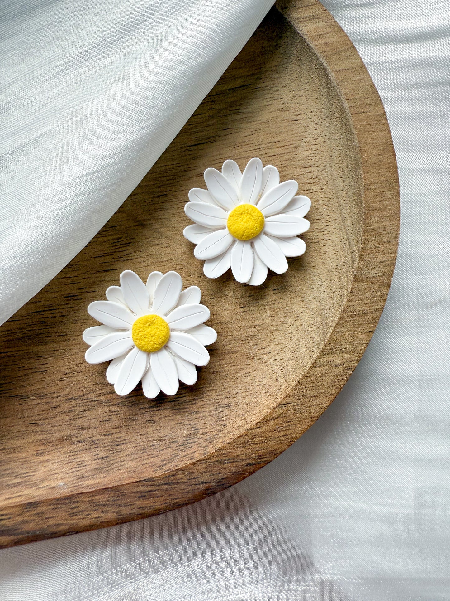 En blomma - valfritt hänge eller stud