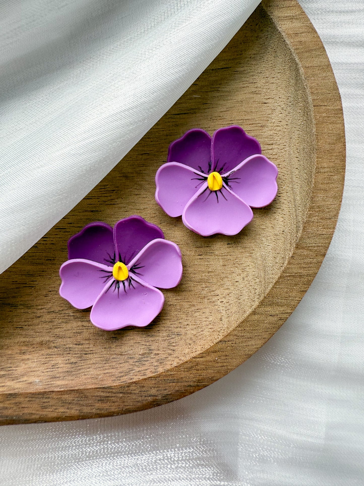 En blomma - valfritt hänge eller stud