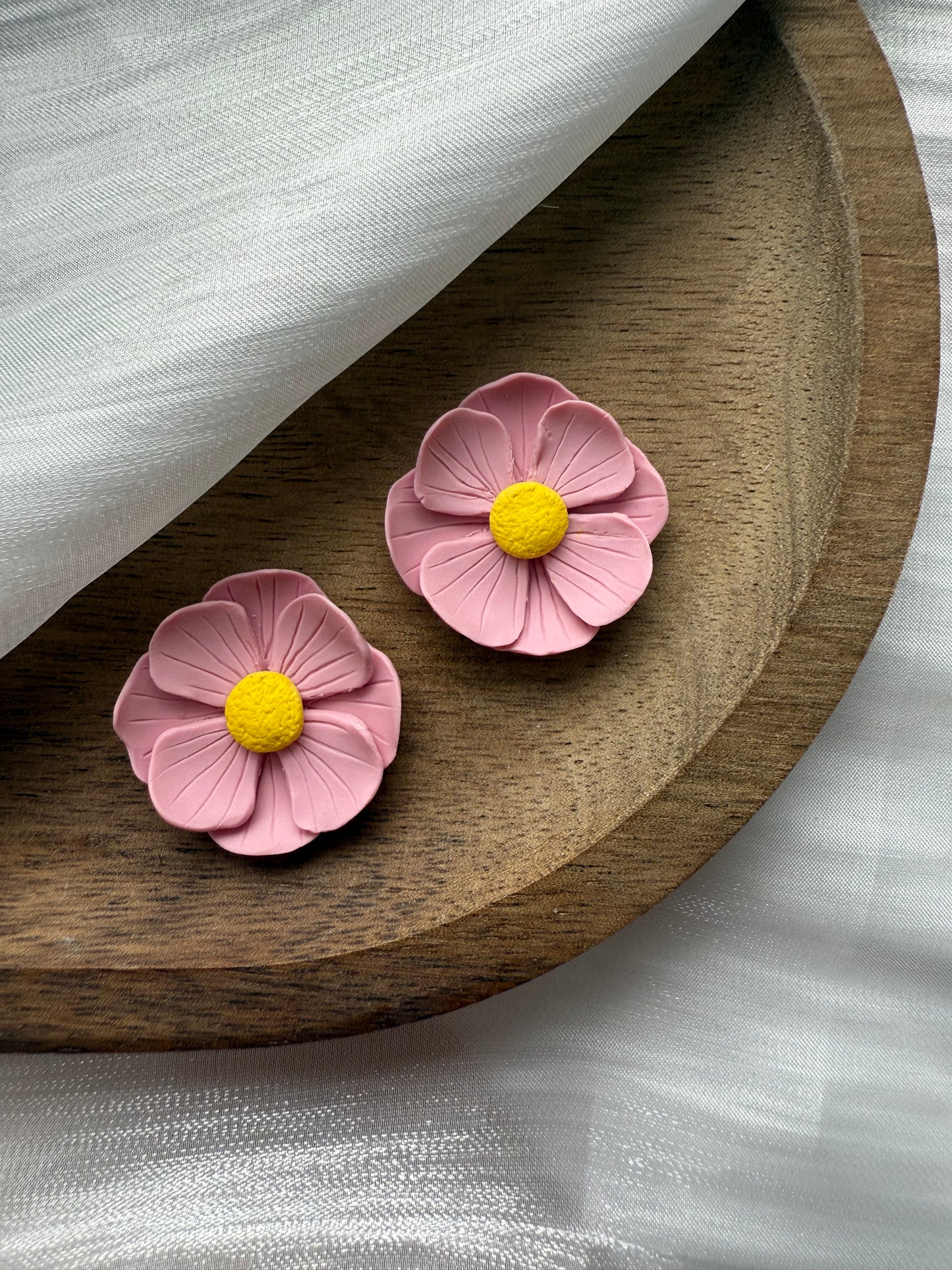 En blomma - valfritt hänge eller stud