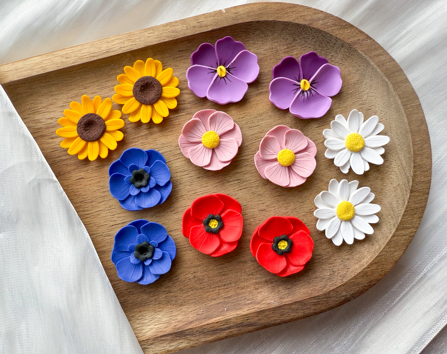 En blomma - valfritt hänge eller stud