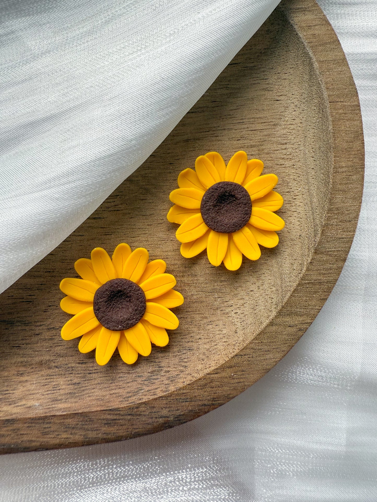 En blomma - valfritt hänge eller stud