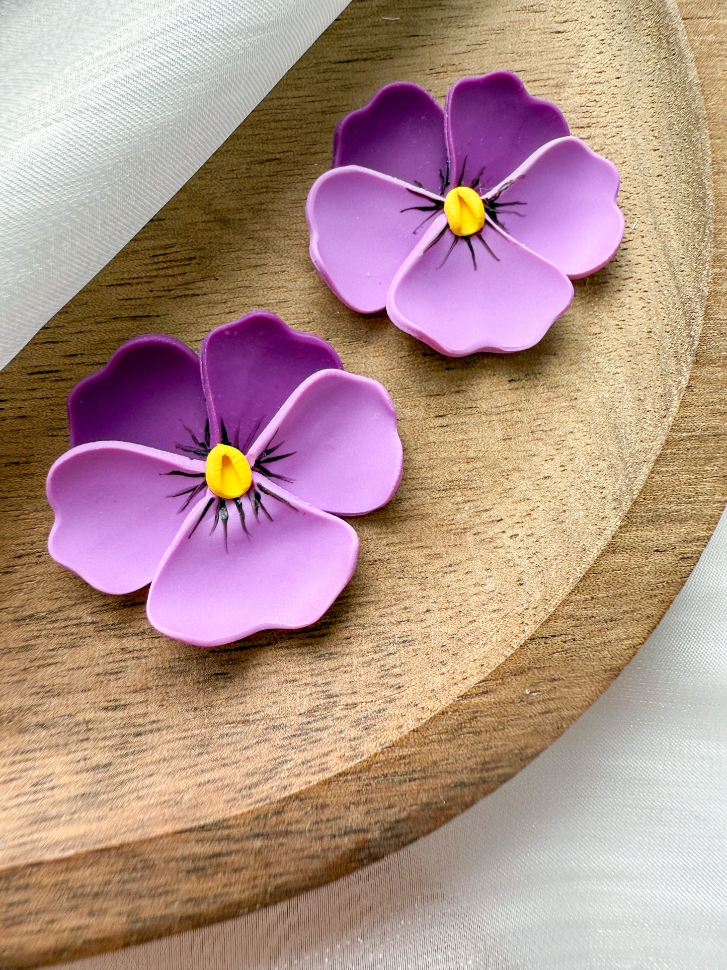 En blomma - valfritt hänge eller stud