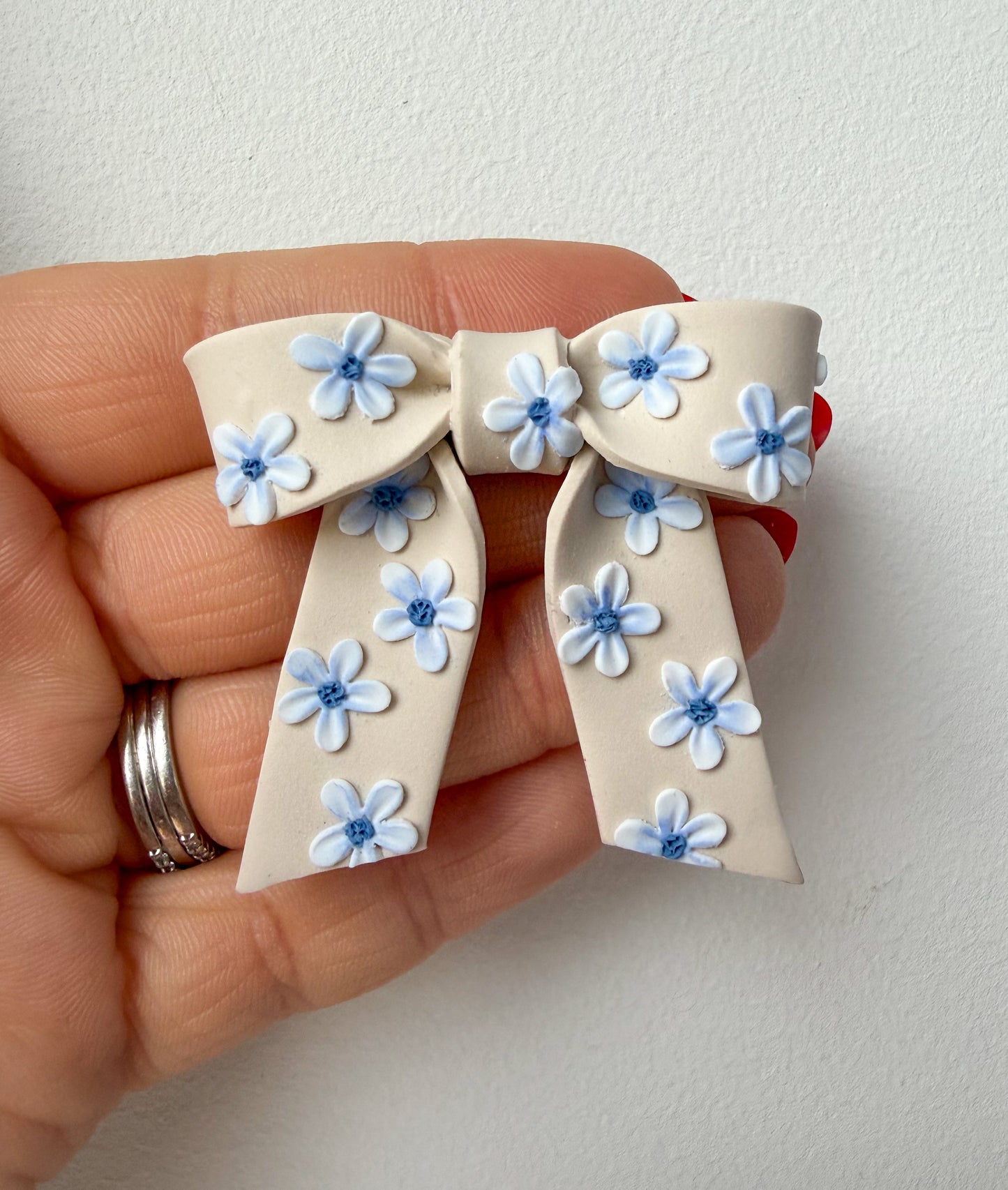 Blommig rosett (flera färgalternativ)