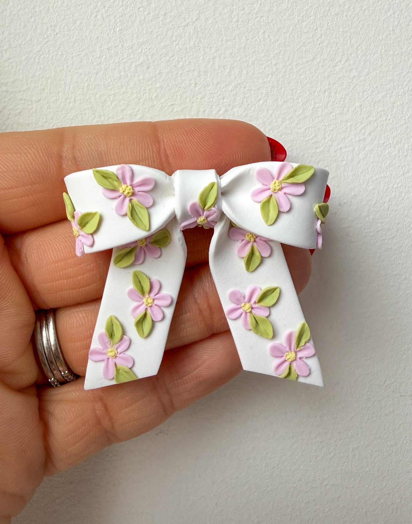 Blommig rosett (flera färgalternativ)